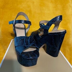 Michael Kors Divia Wedge Embossed Leather shoe in a size 8.5. Color: Luxe Teal